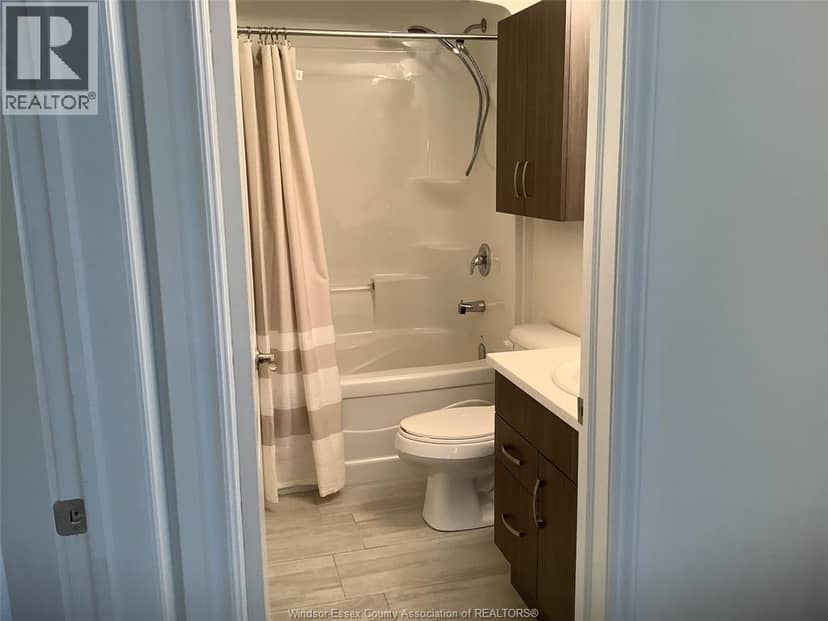 8475 WYANDOTTE STREET East Unit# 211 — photo 16 of 18