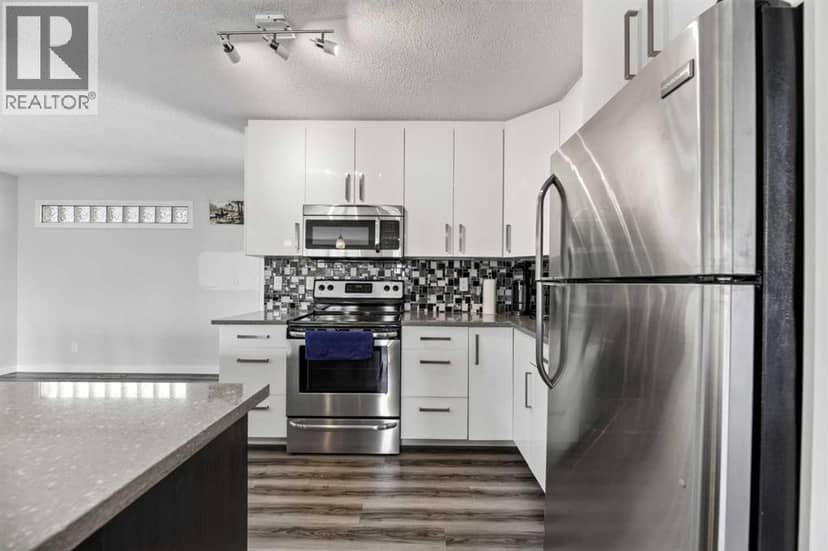 8035 Huntwick Crescent NE — photo 9 of 32