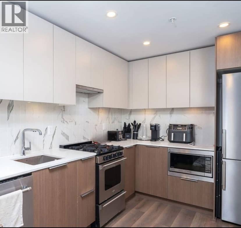 217 645 COMO LAKE AVENUE, Coquitlam, photo 5
