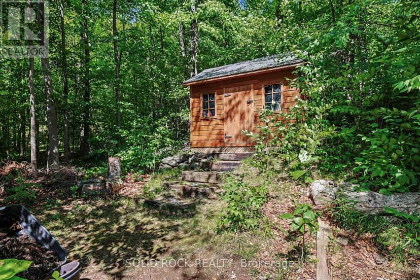 712 Flat Rapids Road — photo 39 of 40