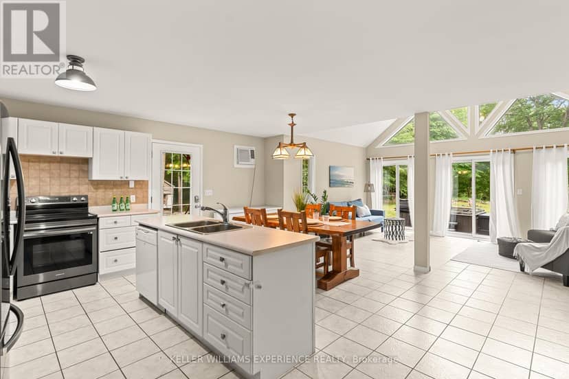 7516 Island Crescent W — photo 9 of 40