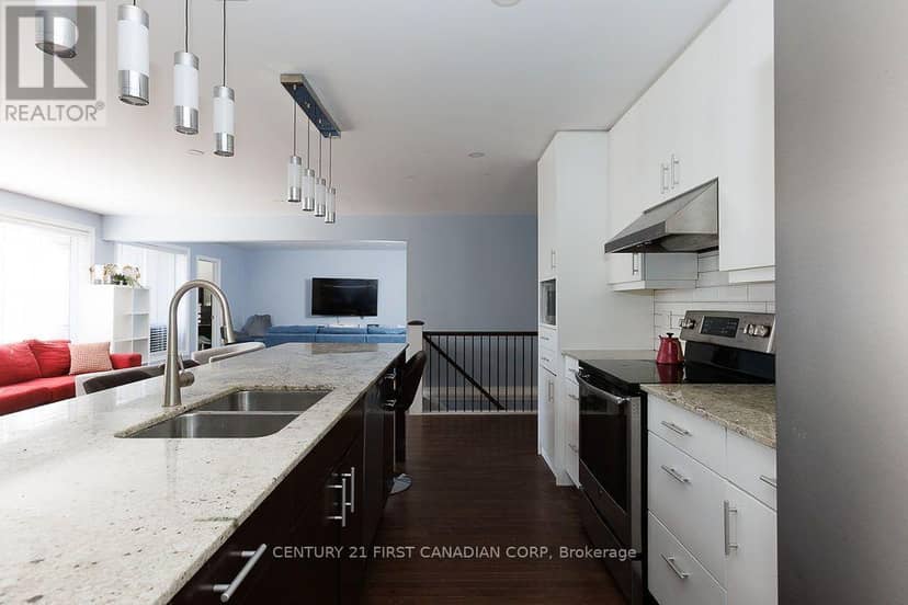 1010 Dearness Drive — photo 10 of 40