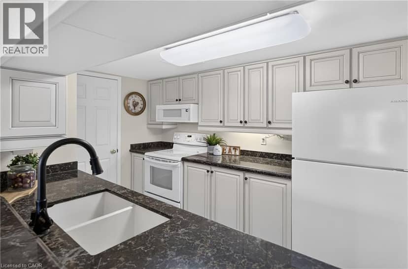 216 W PLAINS Road Unit# B404 — photo 9 of 29