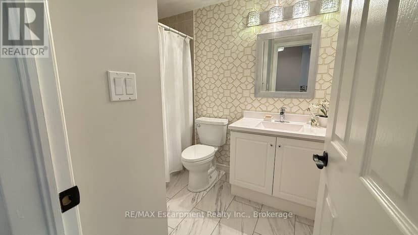 310 - 5188 Lakeshore Road — photo 28 of 40