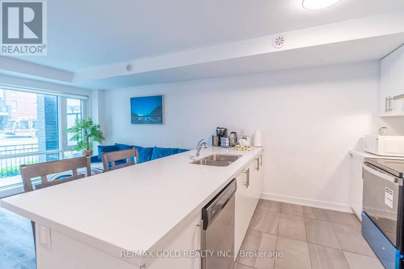 13 - 175 Veterans Drive — photo 10 of 32