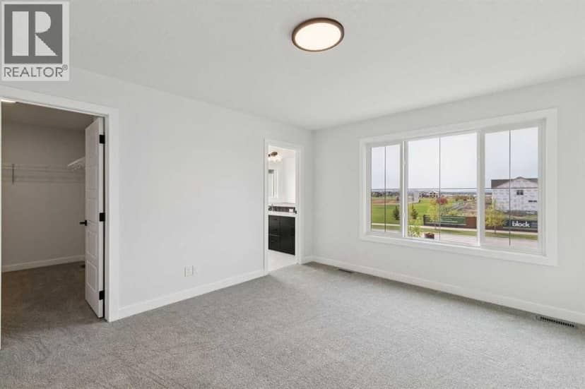 532 Buffaloberry Manor SE — photo 25 of 35