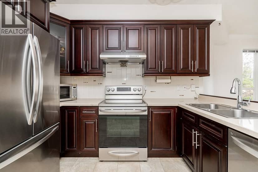 312 3098 GUILDFORD WAY, Coquitlam, photo 6