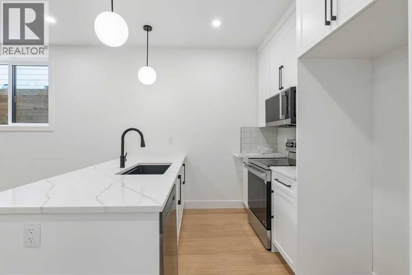 1025 32 Avenue NW — photo 38 of 40