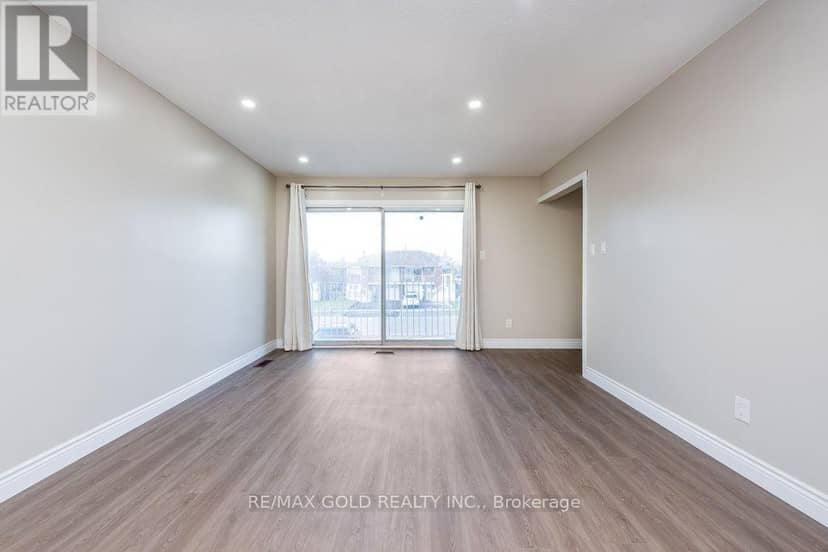 7283 Sigsbee Drive — photo 11 of 40