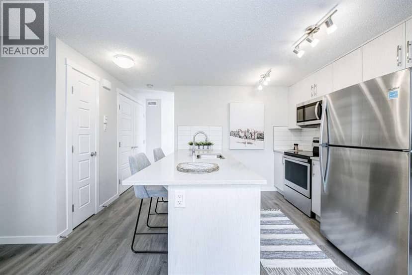101, 260 Rowley Way NW — photo 16 of 37