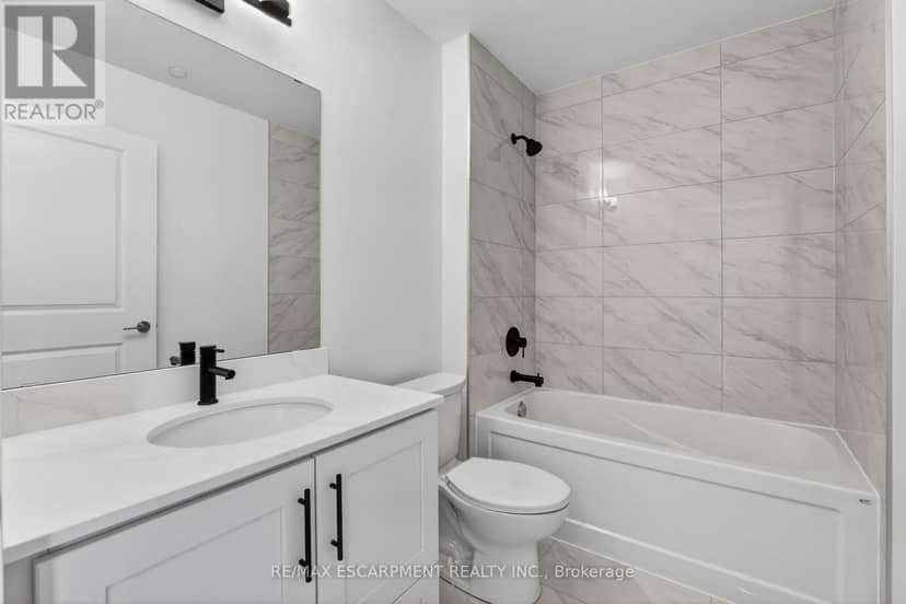 703 - 461 Green Road — photo 10 of 40