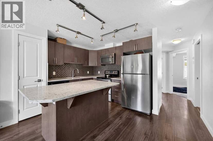 171 Evanscrest Gardens NW — photo 10 of 39