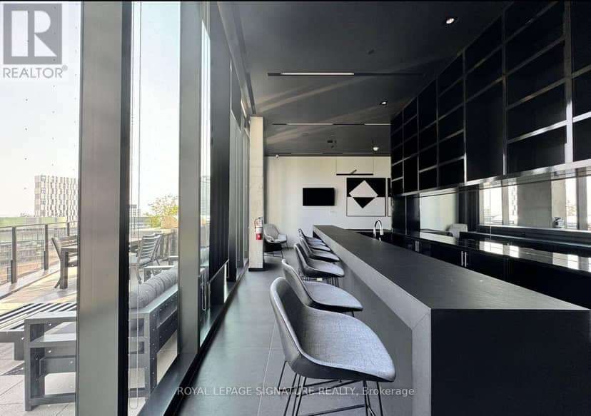 806 - 21 Lawren Harris Square — photo 16 of 18