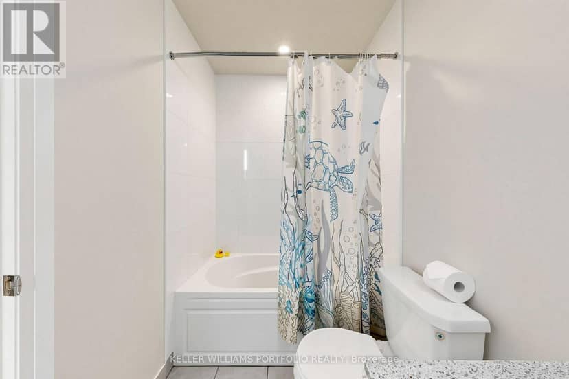 112 - 35 Watergarden Drive — photo 10 of 24