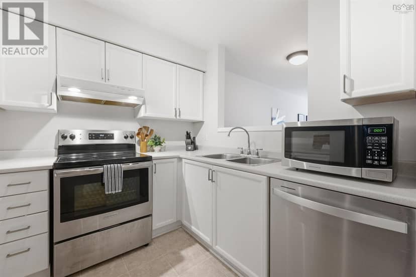 105 5230 Tobin Street — photo 1 of 25
