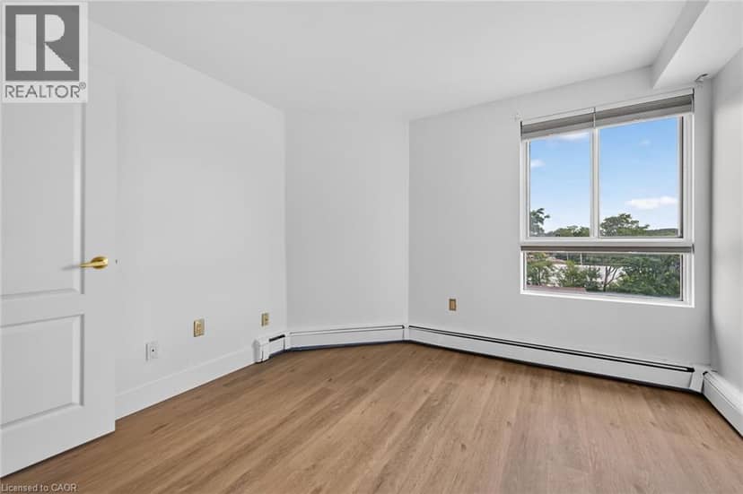 10 JOHN Street W Unit# 409 — photo 29 of 39
