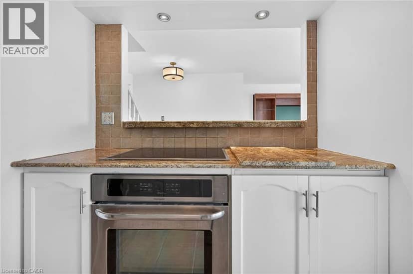 10 JOHN Street W Unit# 409 — photo 21 of 39