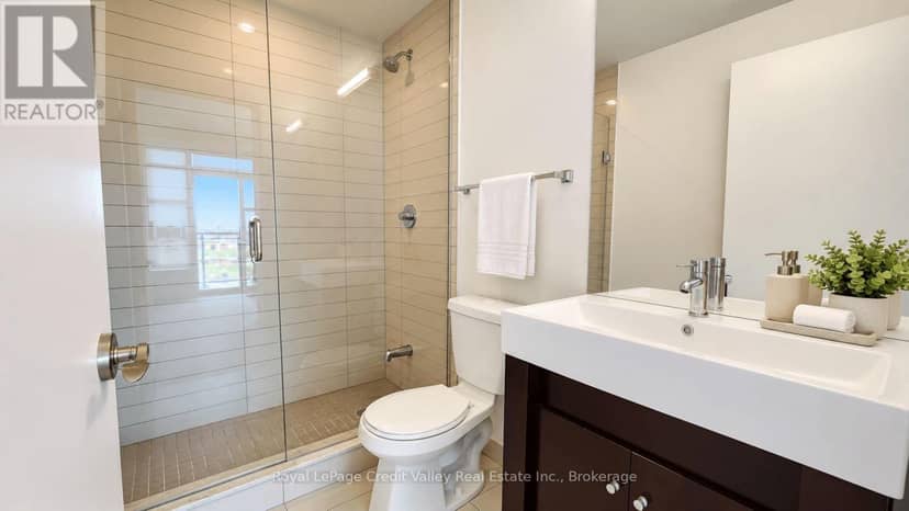 1103 - 840 Queens Plate Drive — photo 15 of 18