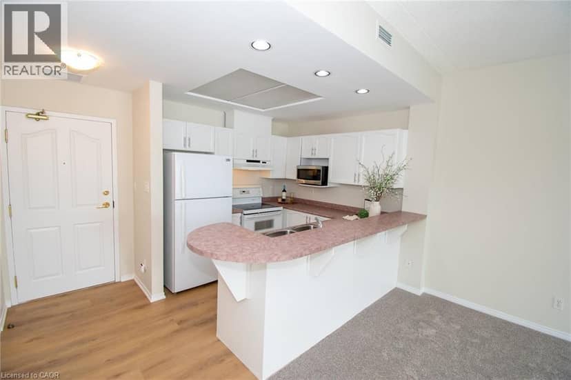210 MAIN Street E Unit# 205 — photo 12 of 40