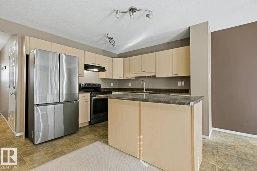 9047 Scott Cr NW — photo 11 of 32