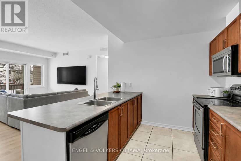 5 - 165 Waterbridge Drive — photo 9 of 16