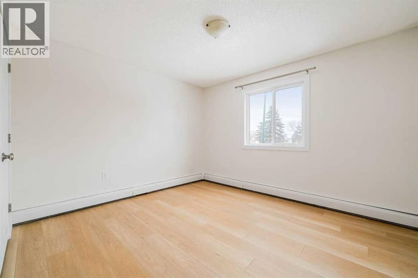 210, 663 12 Street NW — photo 16 of 20