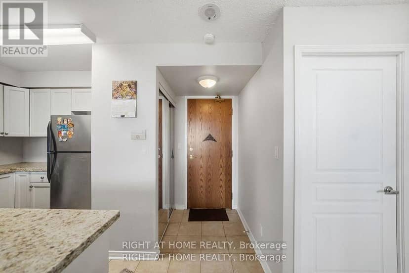 607 - 4879 Kimbermount Avenue — photo 3 of 20