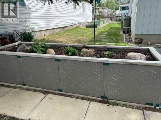 56 Greenbrook Village E, Brooks, photo 3