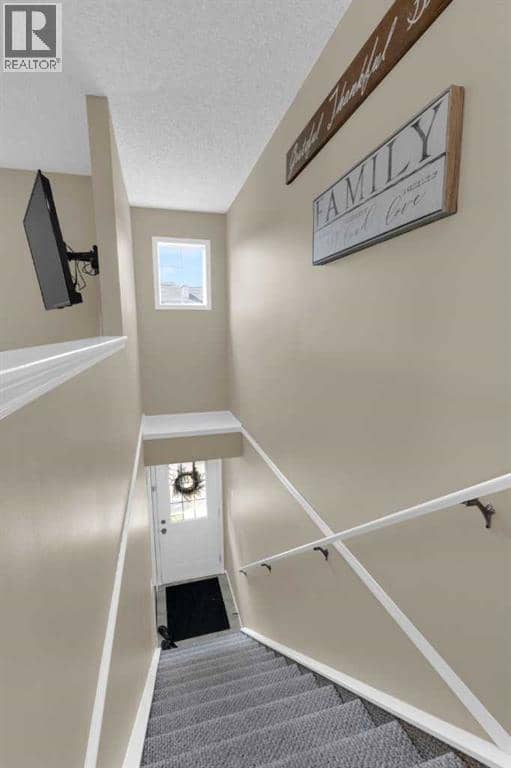 411, 140 Sagewood Boulevard SW, Airdrie, photo 3