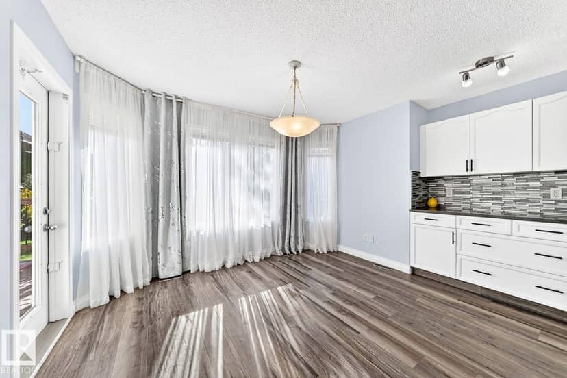 6936 Strom Ln NW — photo 9 of 40