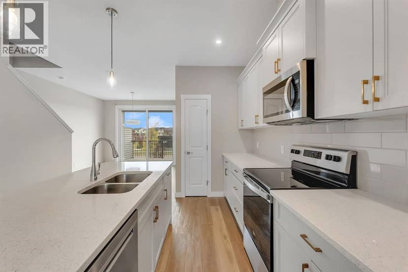 164 Rowmont Boulevard NW — photo 10 of 40