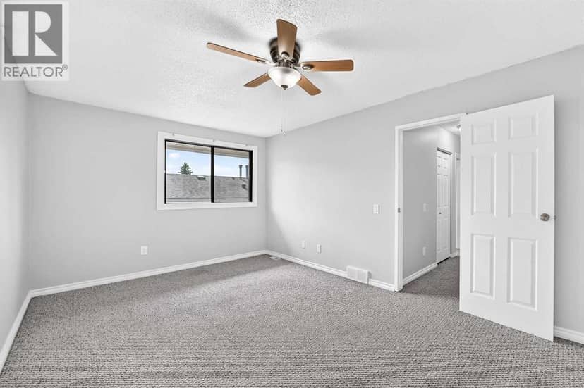 163, 6915 Ranchview Drive NW — photo 27 of 40