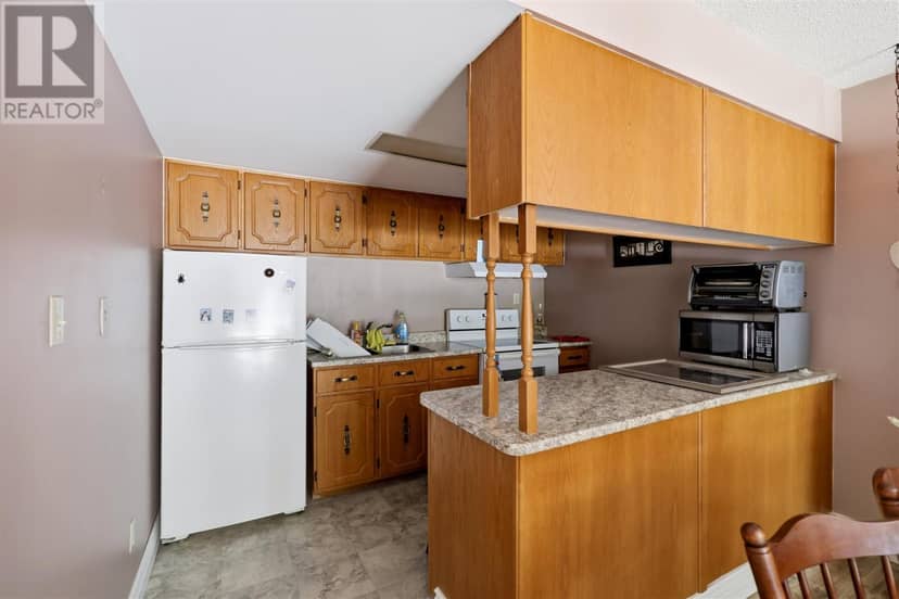 313 MacDonald AVE # 211 — photo 5 of 25