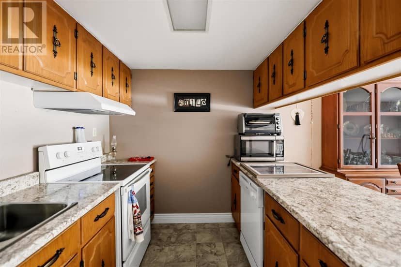 313 MacDonald AVE # 211 — photo 6 of 25