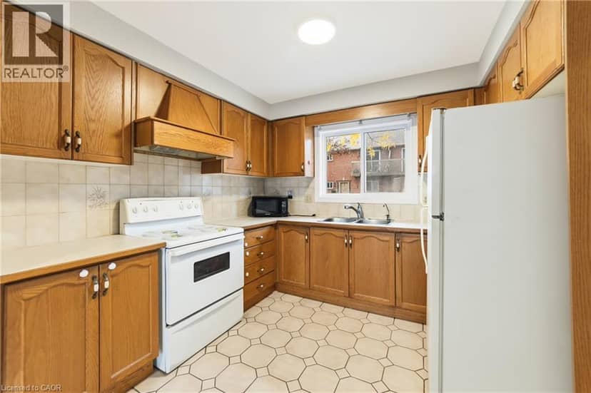 1475 UPPER GAGE Avenue Unit# 5 — photo 8 of 38