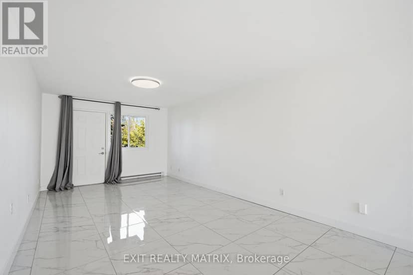 5 - 1015 Cartier Boulevard — photo 9 of 37