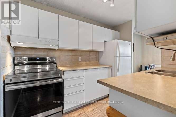 302 - 1103 Jalna Boulevard — photo 17 of 25