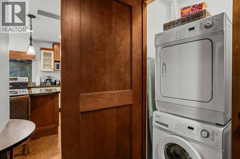 310AB, 173 Kananaskis Way — photo 35 of 40