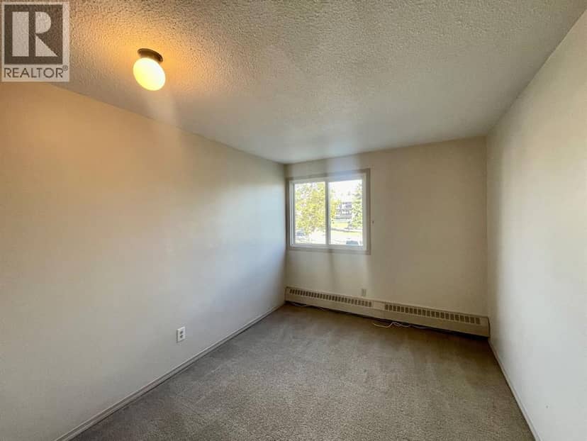 #208B, 5611 9 Avenue — photo 14 of 25