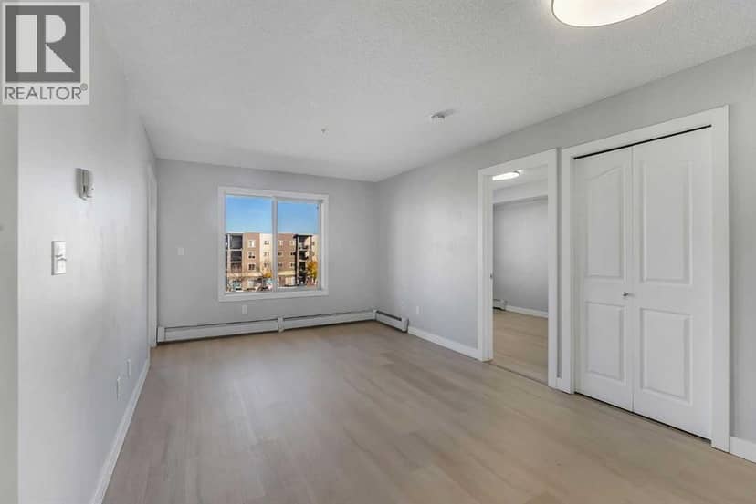 2402, 403 Mackenzie Way SW — photo 14 of 36