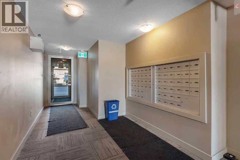2402, 403 Mackenzie Way SW — photo 32 of 36