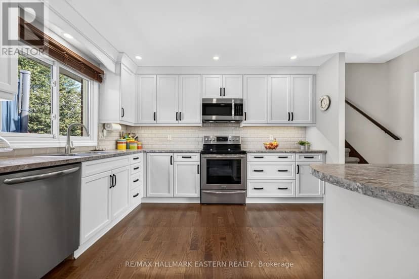 2296 Kawartha Heights Boulevard — photo 9 of 40