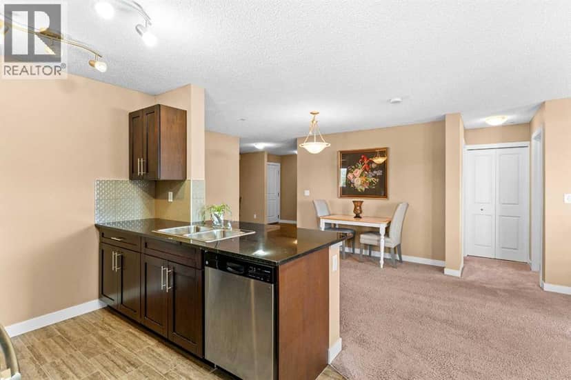 7202, 403 Mackenzie Way SW — photo 10 of 26