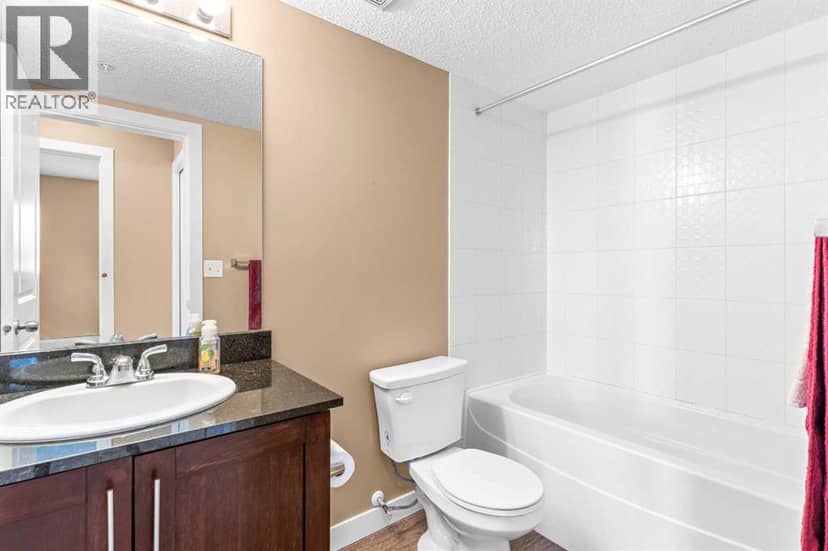 7202, 403 Mackenzie Way SW — photo 21 of 26