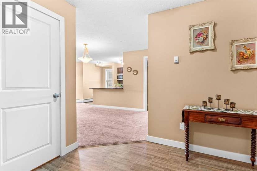 7202, 403 Mackenzie Way SW, Airdrie, photo 3