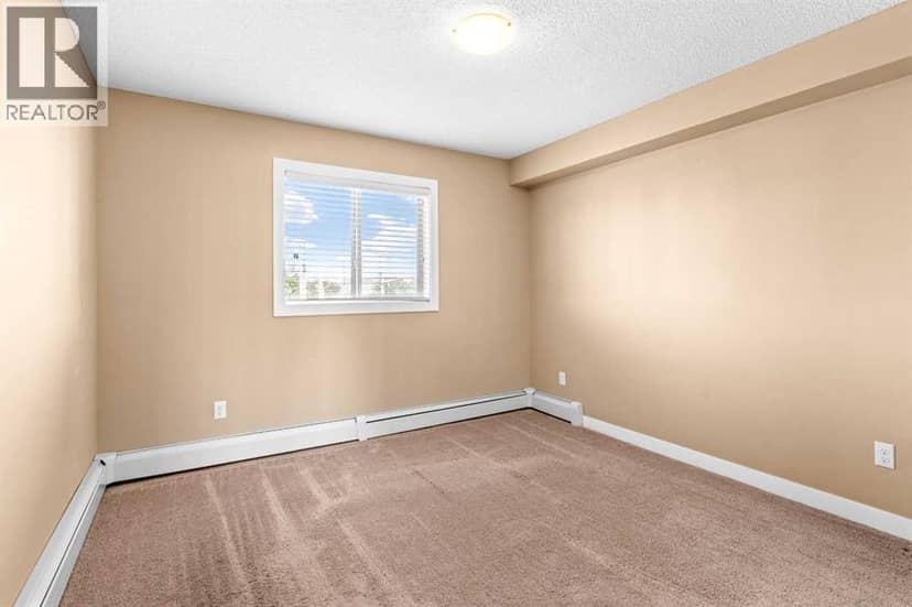 7202, 403 Mackenzie Way SW — photo 15 of 26