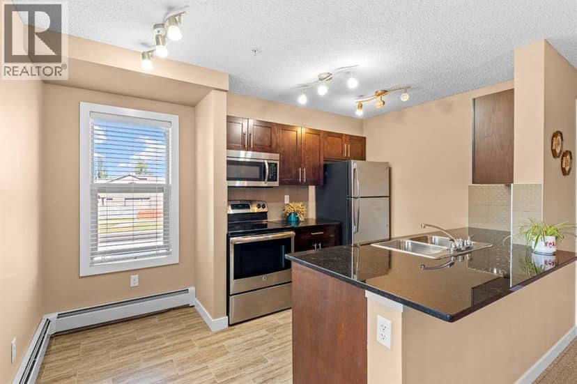 7202, 403 Mackenzie Way SW, Airdrie, photo 7