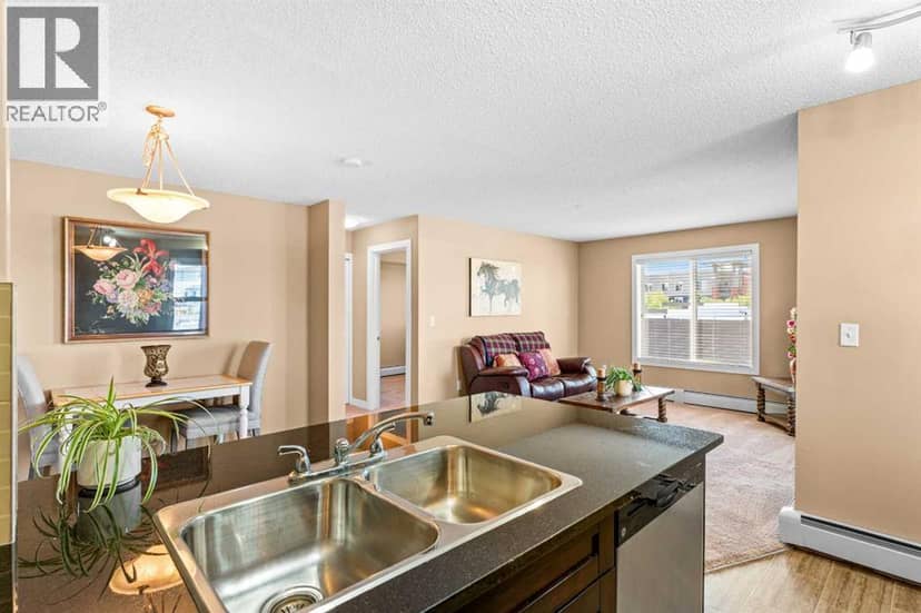 7202, 403 Mackenzie Way SW — photo 11 of 26