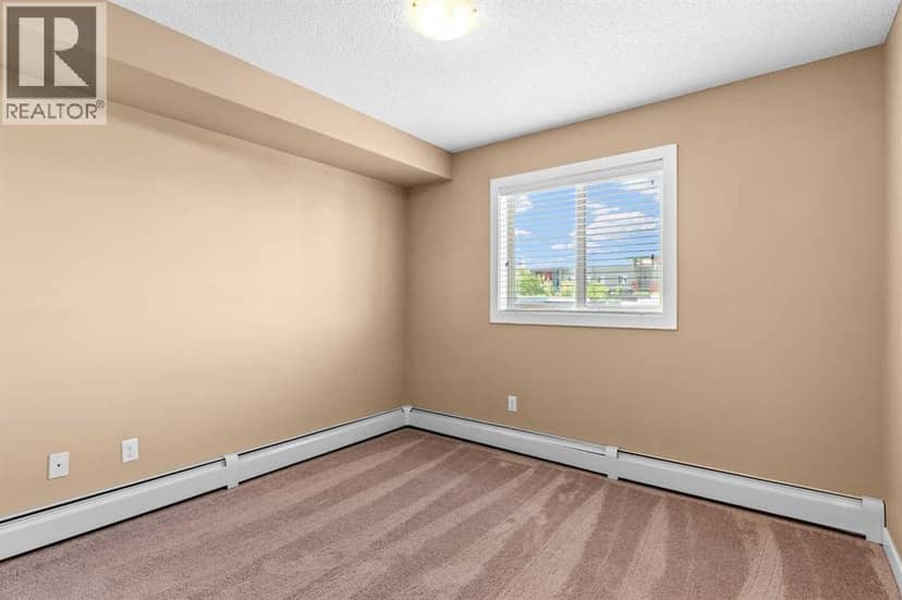 7202, 403 Mackenzie Way SW — photo 20 of 26