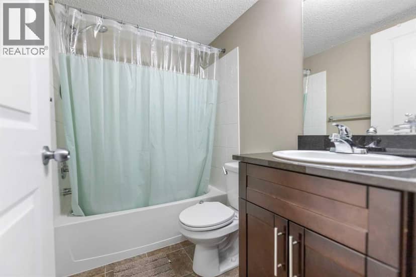 210, 15 Saddlestone Way NE — photo 15 of 34